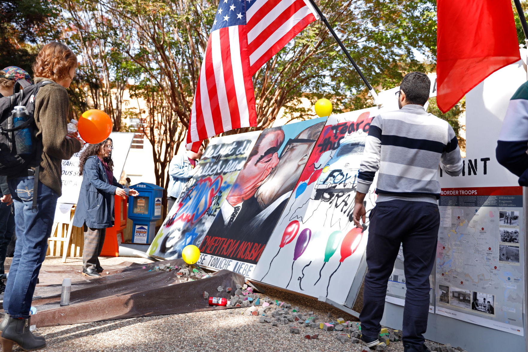 German Week ends with celebration, fall of mock Berlin Wall
